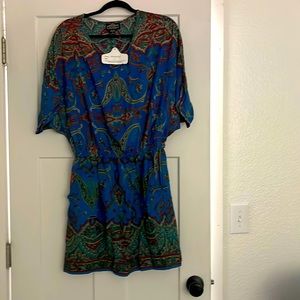 Angie!  Kimono sleeve dress or swimsuit cover up.